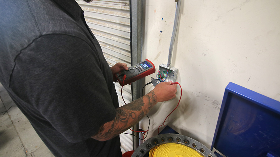 Murphy Electrician Testing Switch